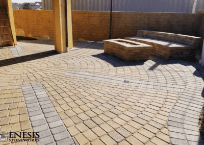 Genesis Stoneworks Circular Patio Paver with Fire Pit and Seating Wall