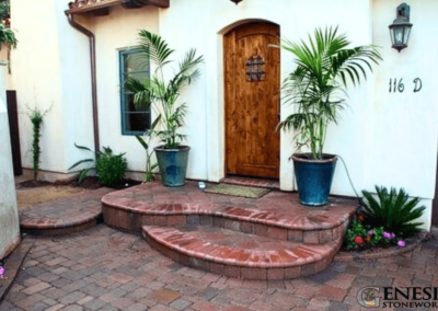 Genesis Stoneworks Textured Paver Entryway with Clay Bullnose Steps